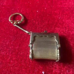 Chic Gold Keychain Purse by [Brand]
